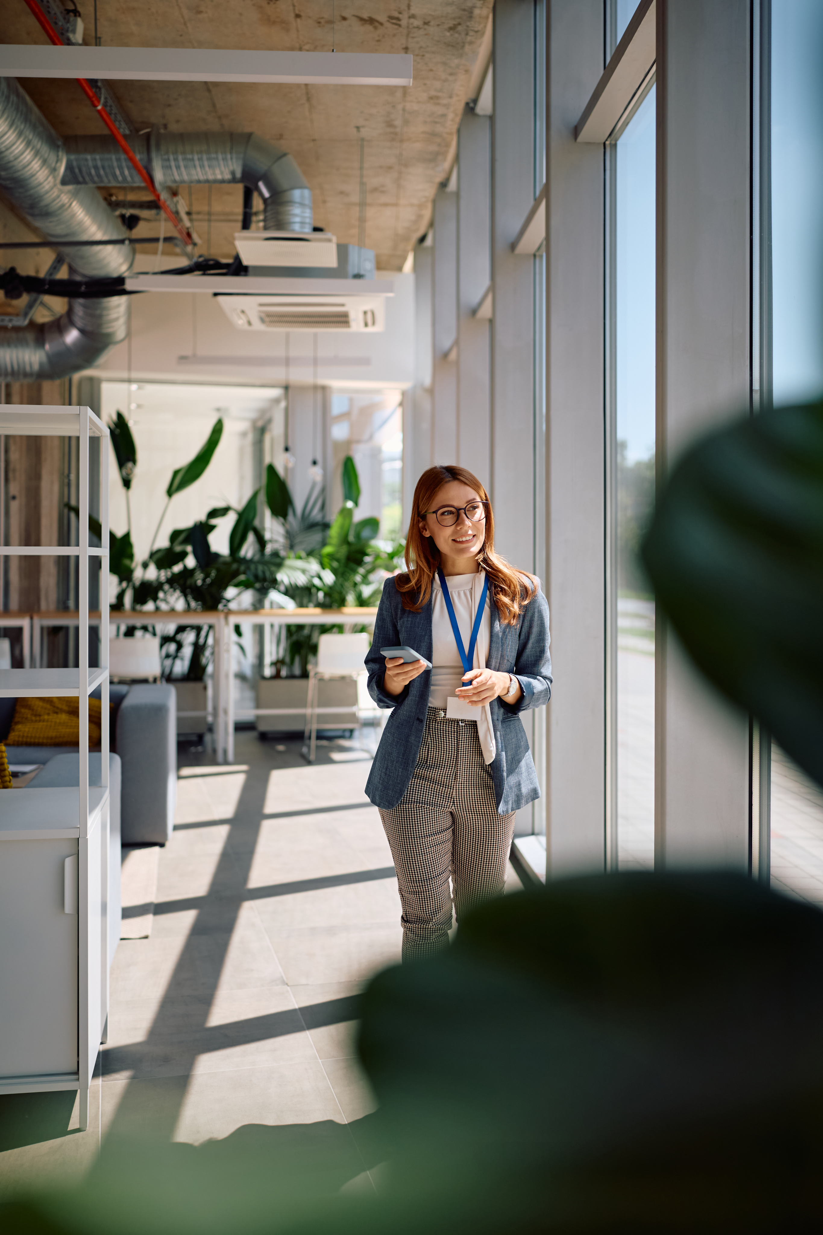 Employee smiling in a modern workplace